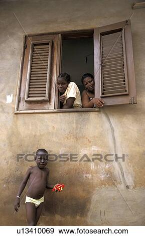 novo, person, porto, window, benin, people View Large Photo Image Stock Photo - novo, person, porto, window, benin, people. Fotosearch