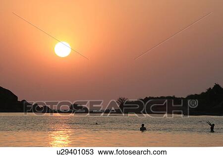 palolem, person, sunset, india, sun, people View Large Photo Image Stock Image - palolem, person, sunset, india, sun, people. Fotosearch