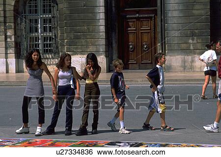 pedestrians, women, females, darkhaired, three, shopping View Large Photo Image Stock Photograph - pedestrians, women, females, darkhaired, three, shopping. Fotosearch