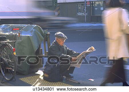 Stock Image - people, reading, male, japanese, woman. Fotosearch