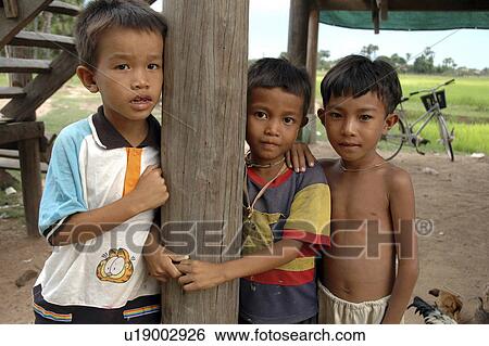 Stock Photograph - person, kampong, boys, cambodia, people. Fotosearch