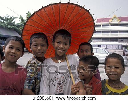 Stock Image - person, umbrella, girls, children, people. Fotosearch