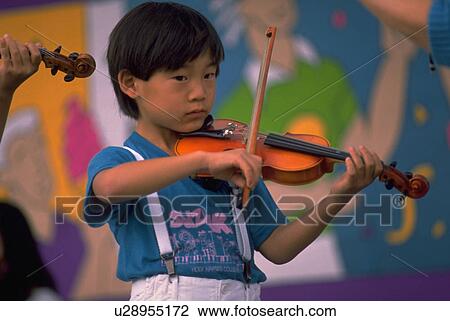 playing, people, boy, children, sport, music View Large Photo Image Stock Image - playing, people, boy, children, sport, music. Fotosearch