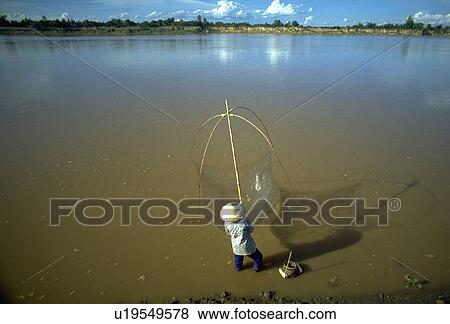 Stock Photo - pole, river, southeast, asia, laos, mekong. Fotosearch