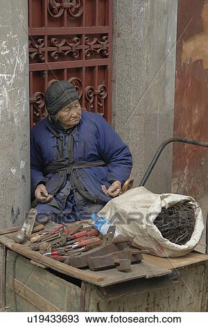 Stock Image - poor, people, very, china, person, woman. Fotosearch