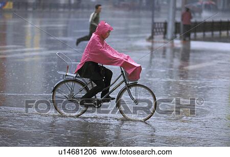 Stock Photograph - rainy, fitness, china, 7173, person, people. Fotosearch