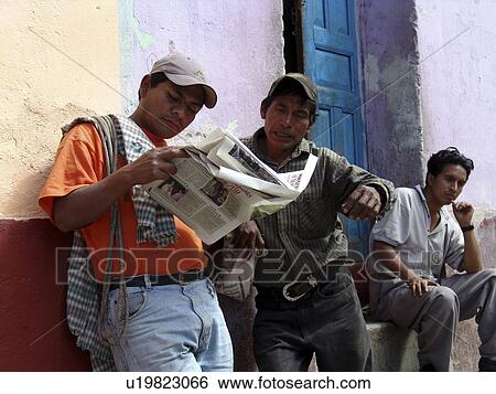 Stock Photograph - reading, technology, men, guatemala, person, people. Fotosearch