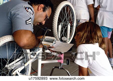 repair, released, bike, demonstrating, policeman, model View Large Photo Image Stock Image - repair, released, bike, demonstrating, policeman, model. Fotosearch