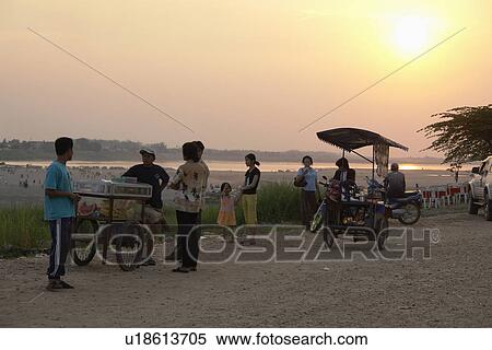 Stock Photography - river, person, besdie, sunset, laos, people. Fotosearch
