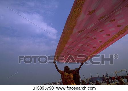 Stock Image - sari, hindu, spreading, female, peasant, woman. Fotosearch