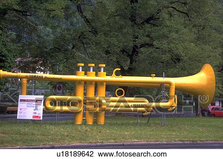 Stock Image - seen, unusual, sculpture, horn, modern, yellow. Fotosearch
