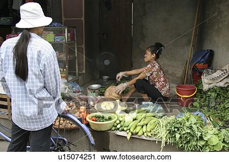 Stock Image - selling, people, female, vietnam, person, woman. Fotosearch