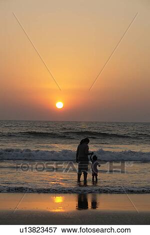 sunset, people, india, sun, person, beach View Large Photo Image Stock Photo - sunset, people, india, sun, person, beach. Fotosearch