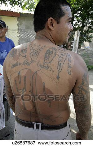 Stock Photo - tattoos, person, member, gang, honduras, people. Fotosearch
