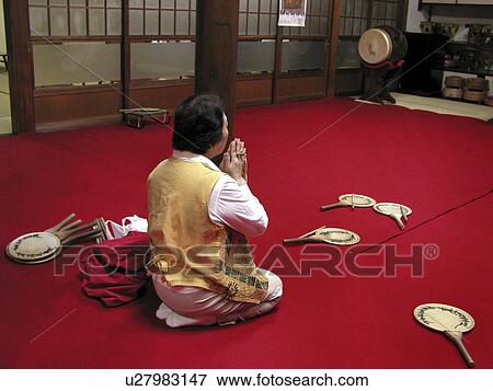 Stock Photo - temple, people, buddhist, japan, person, love. Fotosearch