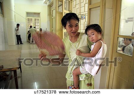 Stock Photo - vietnam, hand, kid, person, child, people. Fotosearch