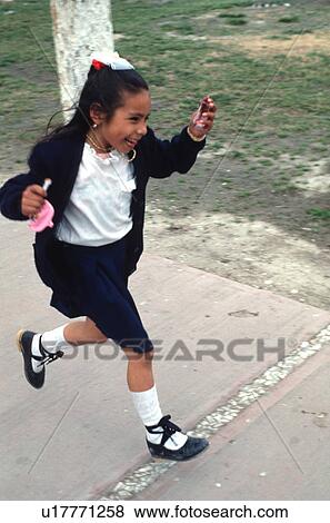 wearing, hispanic, happy, running, girl, mexican View Large Photo Image Stock Photo - wearing, hispanic, happy, running, girl, mexican. Fotosearch