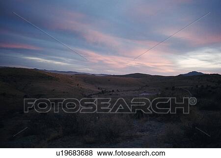 Stock Photo - white, desert, blue, pink, scene, landscape. Fotosearch