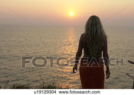 women, beach, sun, person, people, woman View Large Photo Image Picture - women, beach, sun, person, people, woman. Fotosearch