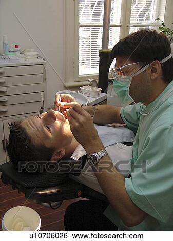 Stock Photograph - work, hand, dentist, bulgaria, person, people. Fotosearch
