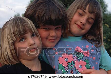 Stock Photo - young, released, girls, sisters, portrait, model. Fotosearch