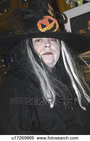 Stock Photo - 64, costumed, age, witch, halloween, scary. Fotosearch