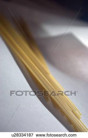 Stock Photo - addendum, spaghetti, accessory, cuisine, food, dry. Fotosearch