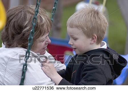 Stock Photograph - age, engaged, playground, conversation, serious, grandma. Fotosearch