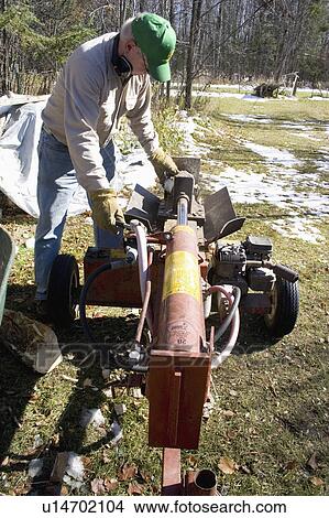 Picture - age, operating, still, 60, male. Fotosearch