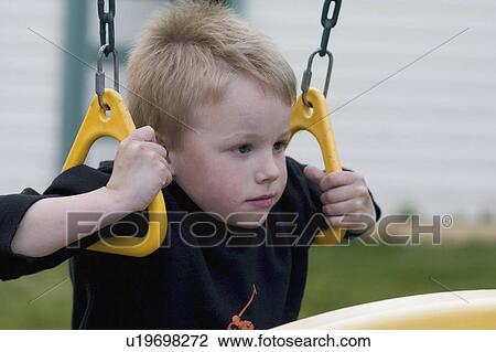 Stock Image - age, rings, shoulder, swinging, boy. Fotosearch