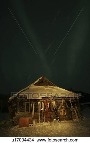 Picture - ak, cabin, wiseman, borealis, aurora, illuminated. Fotosearch
