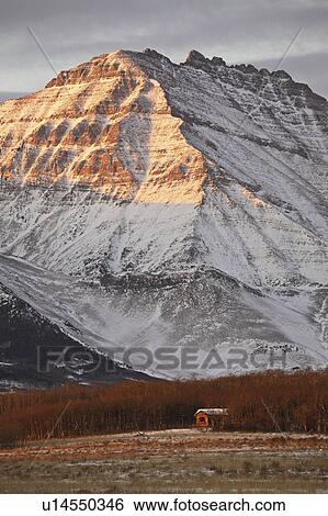 Stock Photograph - alberta, covered, rocky, winter, mountains, snow. Fotosearch