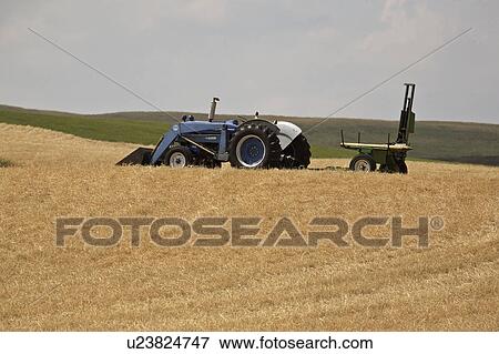Stock Photo - alberta, equipment, southwestern, field, left, tractor. Fotosearch