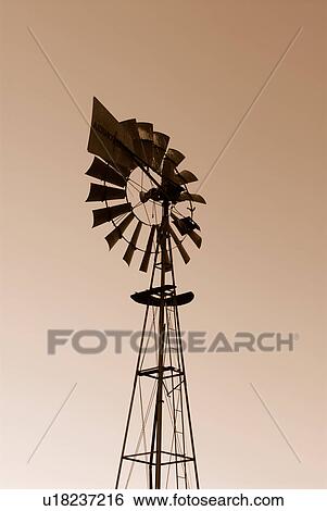 america, sunset, ag, agriculture, desert, windmill View Large Photo Image Stock Photograph - america, sunset, ag, agriculture, desert, windmill. Fotosearch