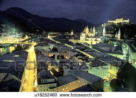Stock Image - austria, salzburg, night, river, salzach, oldtown. Fotosearch