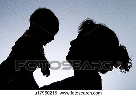 baby, released, holding, mother, silhouette, model View Large Photo Image Stock Photography - baby, released, holding, mother, silhouette, model. Fotosearch