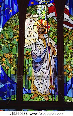 Stock Photo - banner, glass, holding, christ, window, stain. Fotosearch