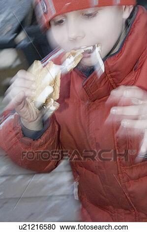 boy, smore, eating, age, blur View Large Photo Image Stock Image - boy, smore, eating, age, blur. Fotosearch