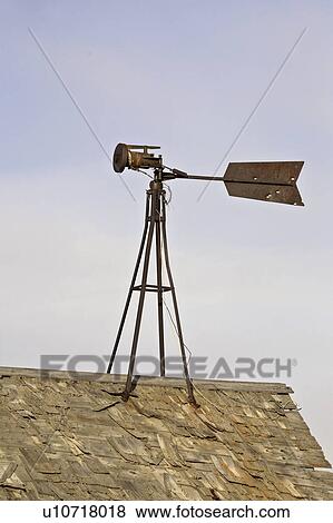 Stock Photo - building, windmill, farm, generator, electric, old. Fotosearch
