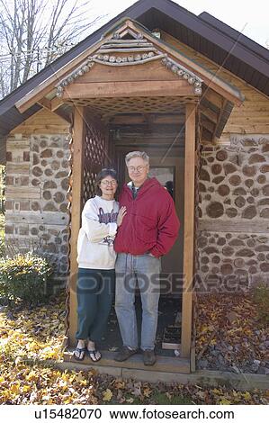 Stock Image - cable, couple, door, cabin, standing, romantic. Fotosearch