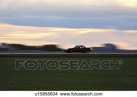 Picture - canada, car, trans, highway, saskatchewan, speeding. Fotosearch