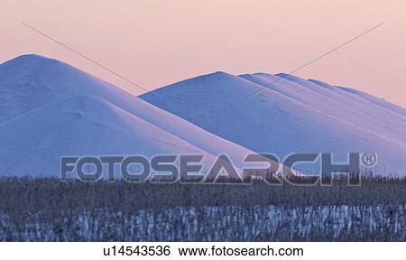 Stock Photograph - canada, piles, saskatchewan, scenic, grain, snowcovered. Fotosearch