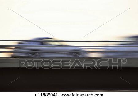 Stock Image - car, 9th, going, panned. Fotosearch