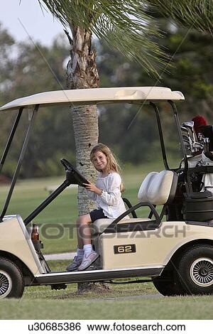 cart, girl, golf, drive, learning, little View Large Photo Image Stock Photograph - cart, girl, golf, drive, learning, little. Fotosearch