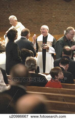 Stock Photo - church, offered, catholic, alphonsus, supplicants, communion. Fotosearch
