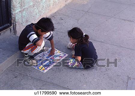 Stock Image - classified, hispanic, reading, kids, children, mexican. Fotosearch