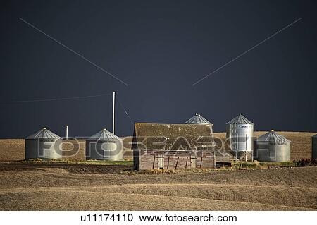 Stock Image - clouds, buildings, farm, storm. Fotosearch