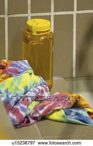 college, bottle, shirt, dye, tie, water View Large Photo Image Stock Photo - college, bottle, shirt, dye, tie, water. Fotosearch
