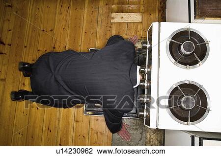 Stock Image - committing, head, sticking, suicide, male. Fotosearch