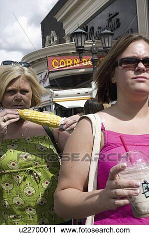 corn, female, eating, 27, age, woman View Large Photo Image Stock Image - corn, female, eating, 27, age, woman. Fotosearch